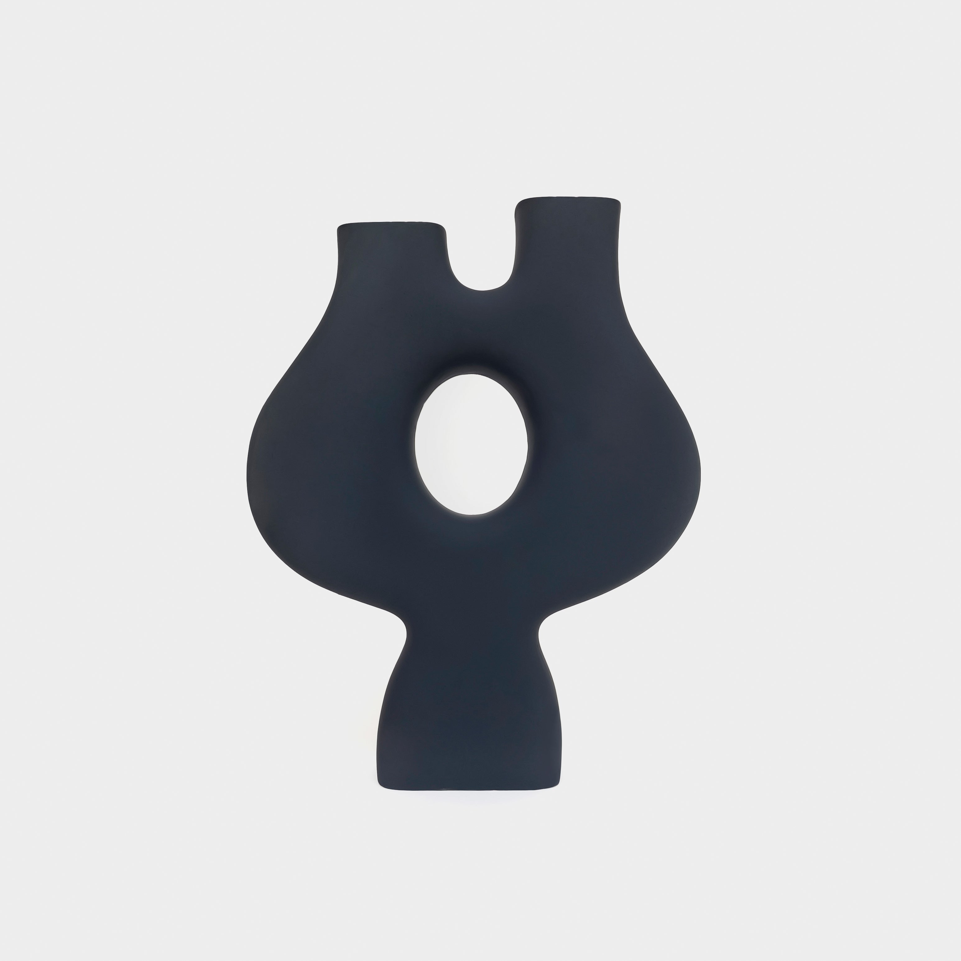 Beau A sculptural form in ivory finish, an example of an abstract organic minimalist shape